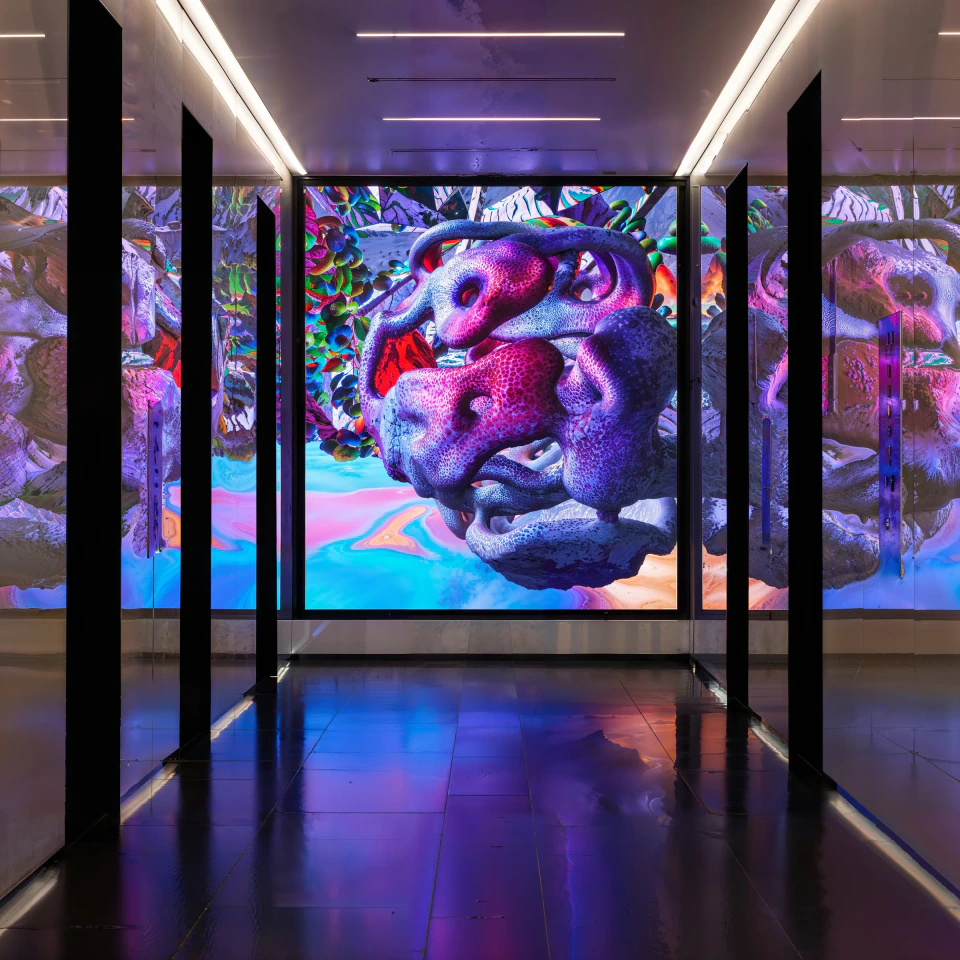 Hypertecture — abstract virtual architecture taking shape on the 1275K LED wall in the building lobby